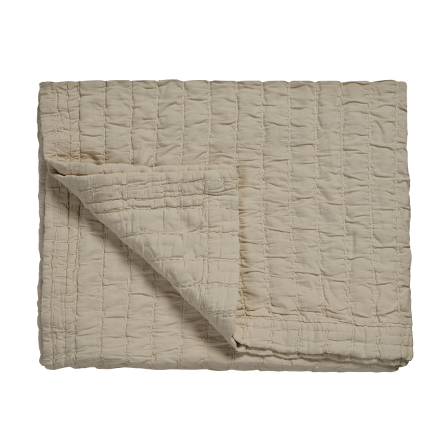 Met de Pure 64 in de kleur linen creëer je een oase van rust in je slaapkamer. Pure 64 is een garment dyed bedsprei met bijpassend kussensloop. Het heeft een gewatteerde look in banen doorgestikt met een grof stiksel. 