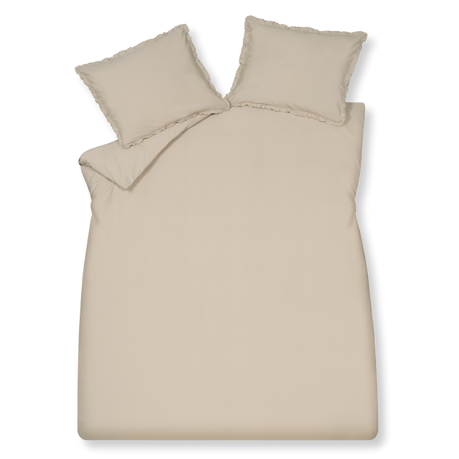 Pure 83 linen dekbedovertrek is aan beide kanten effen beige. De kussens zijn ook beige met ruches langs de zijkanten