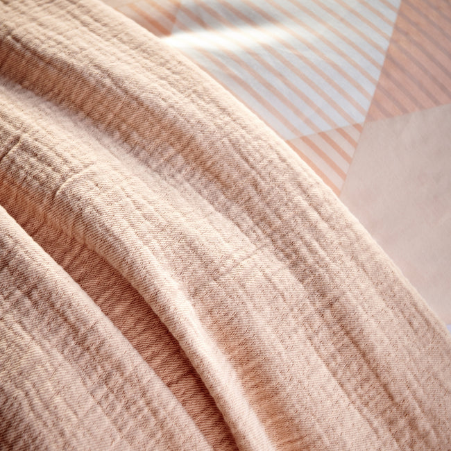 detail shot van een pastel oranje plaid