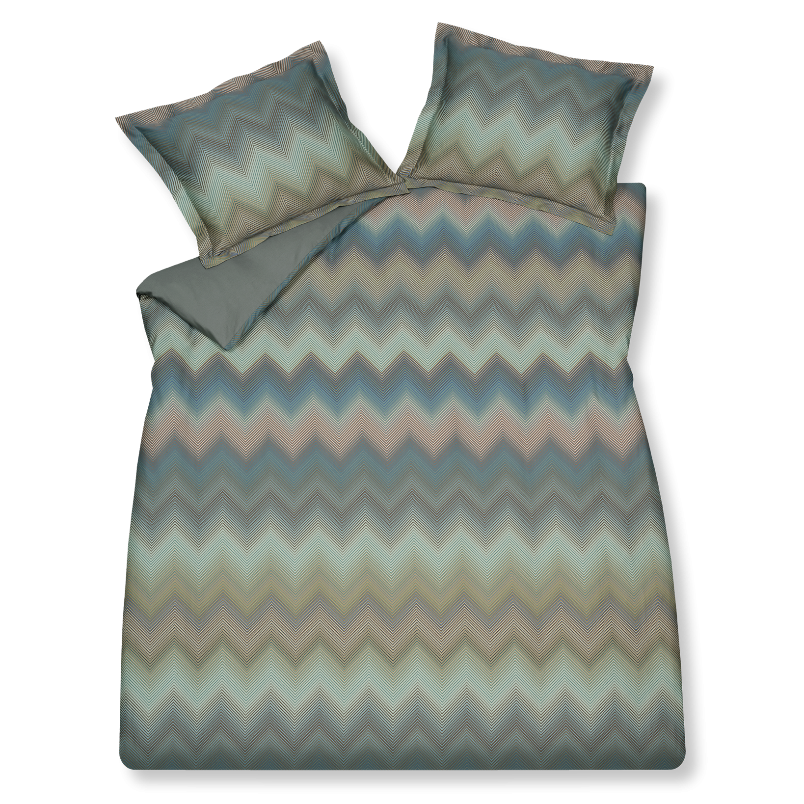Ziggy sage green dekbedovertrek heeft zigzag lijnen in verschillende tinten, groen blauw en rood. Als je er wat langer naar kijkt, dan lijken de lijnen wazig terwijl het strakgetrokken lijnen zijn. De achterkant van het dekbedovertrek is effen. 